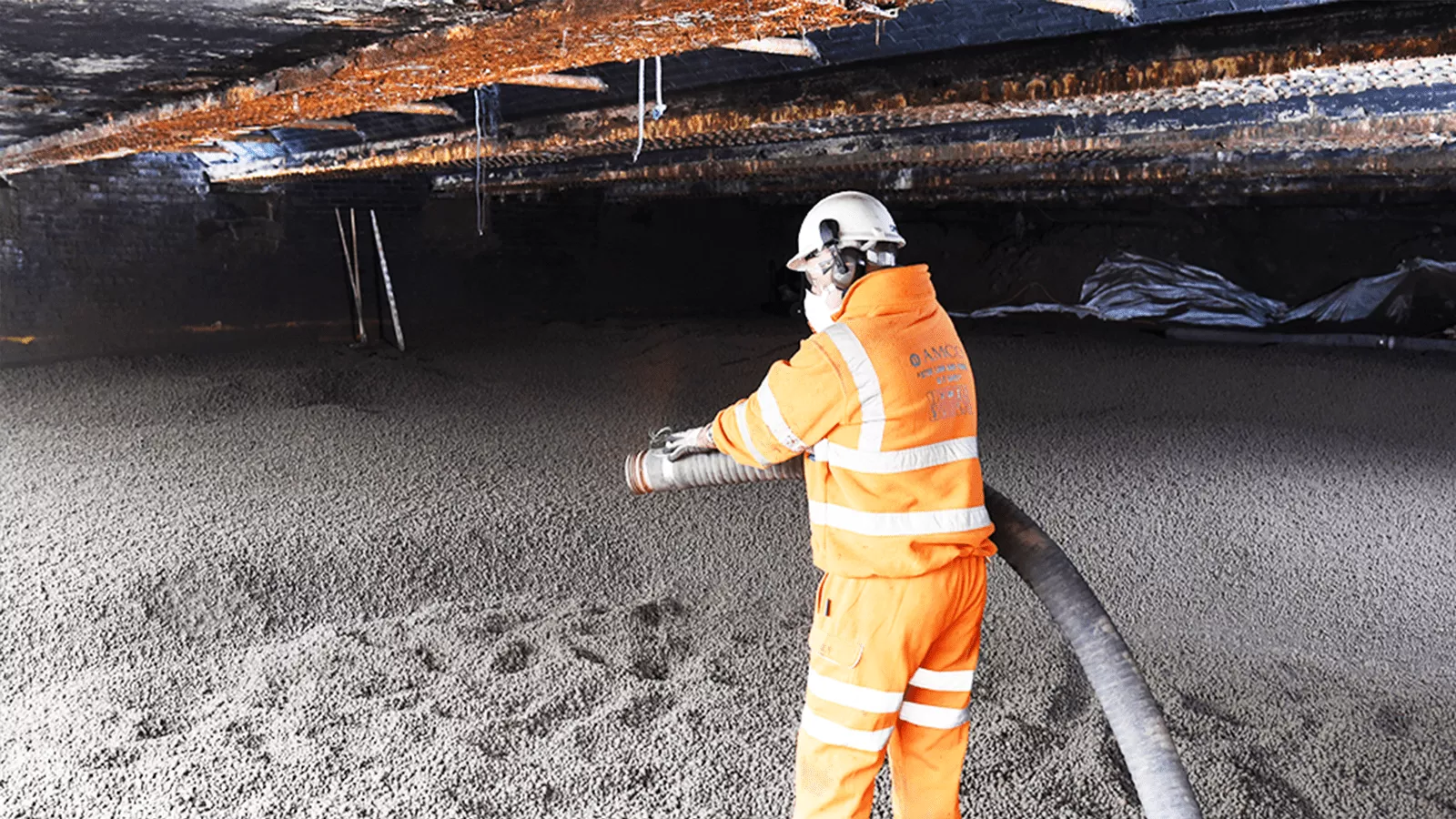 PNEUMATIC DELIVERY FOR INFILL UNDER A RAIL STATION GLASGOW